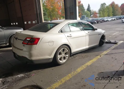 2015 Ford Taurus Sel z USA, uszkodzony, nr VIN 1FAHP2H89FG201969